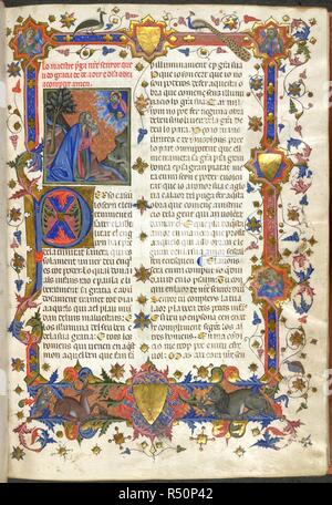 MafrÃ© Ermengau di Bà©ziers. Breviari d'Amour. Spagna [Catalogna]; ultimo trimestre del XIV secolo. (Intero folio] l'autore, MafrÃ© Ermengau di Bà©ziers, vedendo una visione di Cristo benedicente.Il testo con gusto iniziale "P". Decorazione del bordo. In cima; St Michael con croce rossa sullo scudo e lancia bannered, e San Pietro con le chiavi e il libro e un peahen e Peacock. Nel margine destro, un angelo in un octofoil, un cardellino e una quaglia. Ai piedi; un cervo con una scimmia e un leone con un coniglio, entrambi i lati di una protezione oro immagine presa da Breviari d'Amour. Originariamente pubblicato/prodotto in Foto Stock