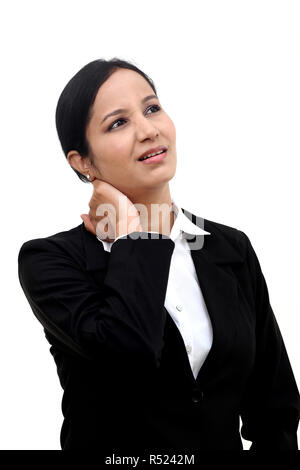 Business donna che soffrono di dolore al collo Foto Stock