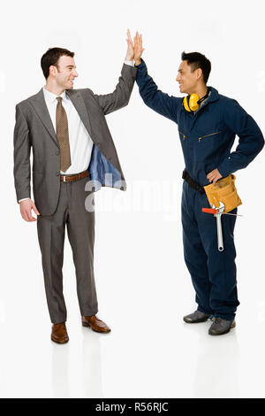 Imprenditore e operaio Foto Stock