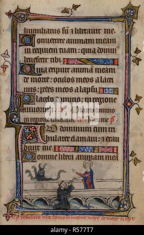 Bas-de-page scena della Vergine Maria il salvataggio il monaco che il diavolo aveva tentato di affogare, con una didascalia di lettura, â€˜Cy resuscite n[ost]re dame le moyne noye de mort un vye. Libro d Ore, uso di Sarum ("Taymouth ore"). Inghilterra, S. E.? (Londra?); secondo quarto del XIV secolo. Fonte: Yates Thompson 13, f.152. Lingua: Latino e francese. Foto Stock