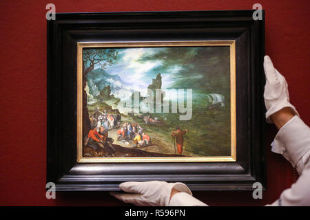 Sothebys. Londra, Regno Unito. 30 nov 2018 - Un tecnico contiene 'paesaggio invernale con pattinatori, olio su pannello di quercia' di Pieter Brueghel il Giovane (est £700.000 - 900.000 sterline). Capolavori che coprono oltre due millenni comprendente il vecchio master & British dipinti anteprima al Sothebys. Credito: Dinendra Haria/Alamy Live News Foto Stock