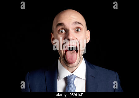 Mostra la sua lingua Foto Stock