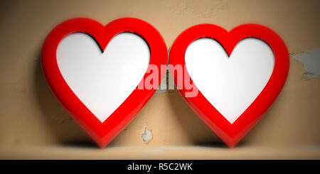 Il giorno di San Valentino, il concetto di amore. Due rosso a forma di cuore cornici vuote sulla parete sbiadito sfondo, spazio di copia Foto Stock