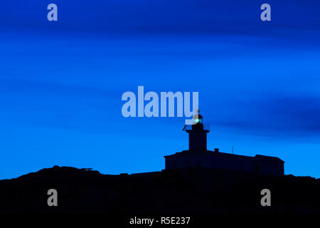 Francia, Corsica, Haute-Corse Reparto, La Balagne Ile Rousse, Ile de la Pietra, faro, crepuscolo Foto Stock