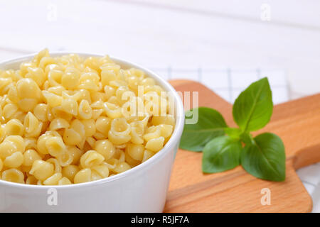 Piccole conchiglie di pasta Foto Stock