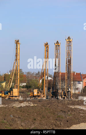 Quattro idraulici di macchine di foratura sul sito in costruzione industry Foto Stock