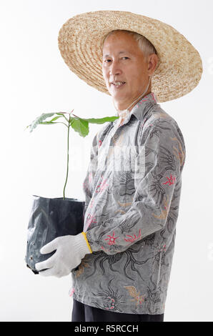 Asian vecchio contadino Foto Stock