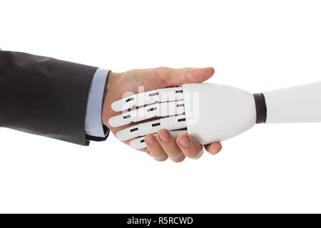 I mediatori stringono le mani con il Robot Foto Stock