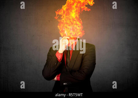 Fire testa Business Man Foto Stock