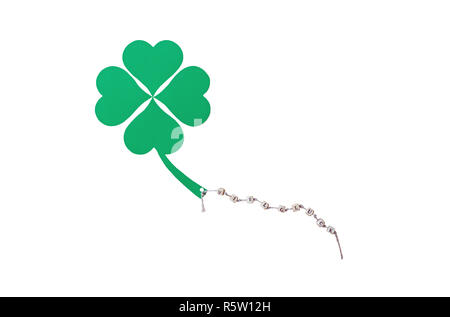 Le parole di buona fortuna e un shamrock su un filo,tagliare Foto Stock