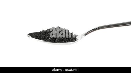 Chiudere cucchiaio in metallo di colore nero di sale hawaiano Foto Stock
