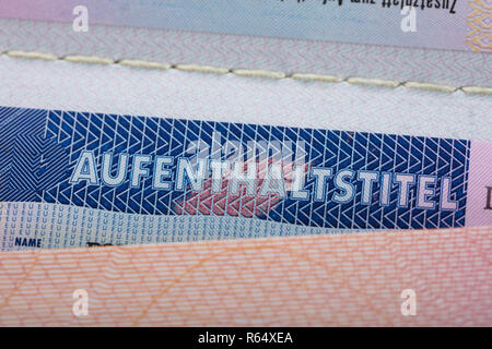 Testo Aufenthaltstitel sul passaporto Foto Stock