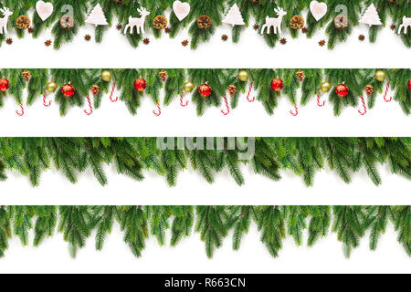 Set di albero di Natale rami su uno sfondo bianco come un confine Foto Stock