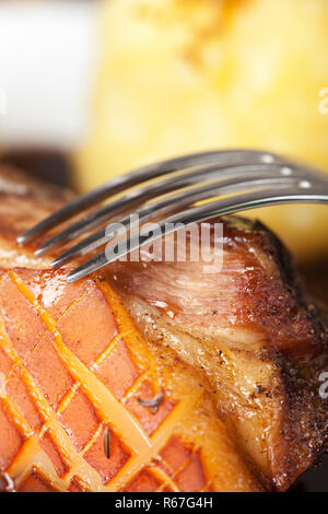 Forcella di arrosto di maiale Foto Stock