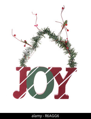 Festa di Natale messaggio di saluto con la parola gioia scritto in lettere in legno Foto Stock