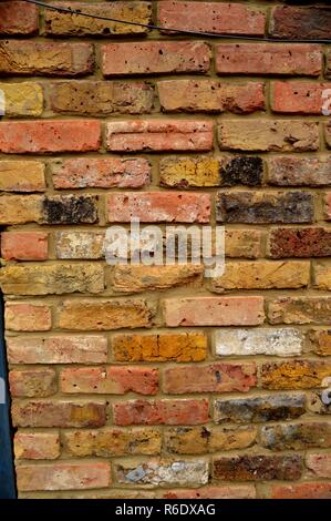 Rigenerate Londra muro di mattoni Foto Stock