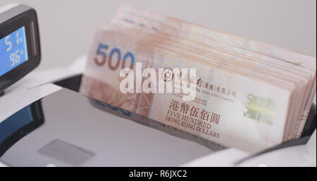 Le banconote in macchina di conteggio Foto Stock