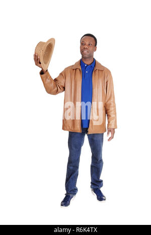 Bel uomo in piedi in giacca di pelle marrone Foto Stock