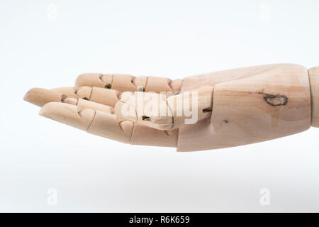 Il gesto di una articolata a mano in legno Foto Stock