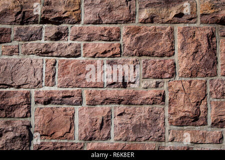 Pezzo di vecchio muro di pietra Foto Stock