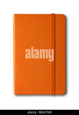 Arancione notebook chiuso isolato su bianco Foto Stock