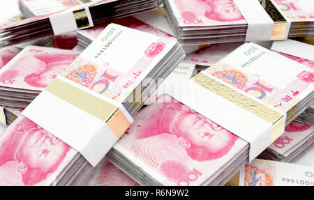 Un mucchio di casualmente disperse fasci di yuan cinese banconote isolato su un background - 3D render Foto Stock