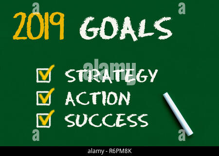 Anno Nuovo 2019 Obiettivi sulla lavagna verde Foto Stock