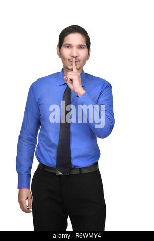 Immagine dell uomo d affari asiatici fare silenzio gesto con il dito sulle labbra Foto Stock