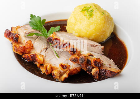 Bavarian arrosto di maiale con canederli Foto Stock