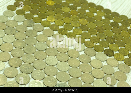 Lo sfondo delle monete di marrone cento Foto Stock
