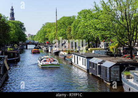 Case galleggianti sul canale Prinsengracht in Amsterdam, Paesi Bassi Foto Stock