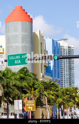 Miami Beach Florida, Collins Avenue, A1A, semaforo, luci, edificio, torre faro, blocco di vetro, architettura, architettura, intersezione, angolo, cartello, logo, Foto Stock