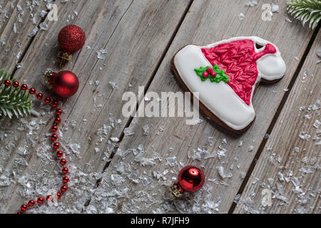 Il Natale di zenzero biscotti di pane vecchio legno sfondo tabella per grafica e web design, moderno semplice concetto di internet. Moda per la progettazione di siti web o web Foto Stock