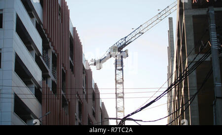 L'industria sito in costruzione. Lavoro gru a torre. Industrial Foto Stock