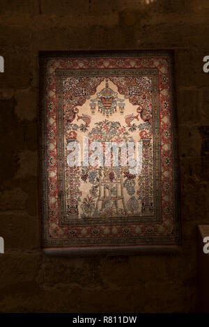 Tappeto,oriental rug all'interno della torre di Calahorra museum, Cordoba. Andalusia, Spagna. Foto Stock