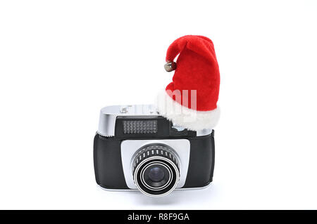 Santa Claus Little Red Riding Hood e vintage fotocamera per fotografare su un bianco sfondo isolato Foto Stock