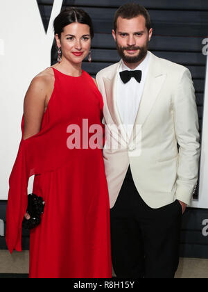 BEVERLY HILLS, Los Angeles, CA, Stati Uniti d'America - 26 febbraio: Amelia Warner, Jamie Dornan arriva a 2017 Vanity Fair Oscar Party a Wallis Annenberg Center for the Performing Arts nel febbraio 26, 2017 a Beverly Hills Los Angeles, California, Stati Uniti. (Foto di Xavier COLLIN/Image Press Agency) Foto Stock