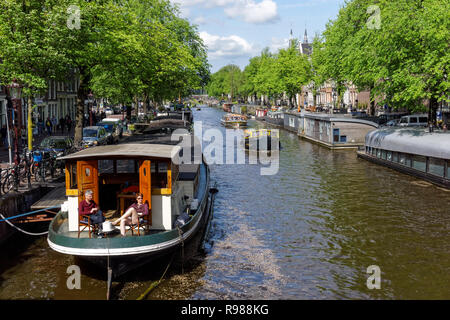 Case galleggianti sul canale Prinsengracht in Amsterdam, Paesi Bassi Foto Stock