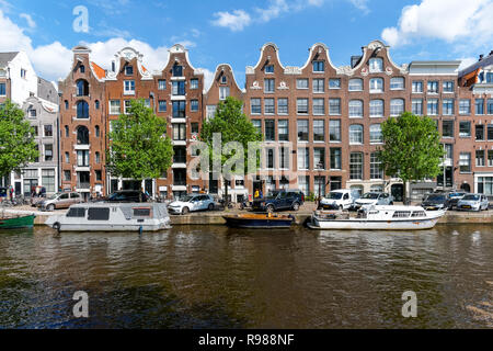 Case olandesi tradizionali a canale Prinsengracht in Amsterdam, Paesi Bassi Foto Stock