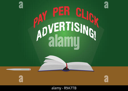 Segno di testo mostra Pay Per Click pubblicità. Foto concettuale di tipo moderno di online marketing promozione di pagine a colori del Libro Aperto foto sul tavolo con P Foto Stock