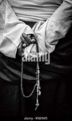 I grani di preghiera che si terrà Foto Stock