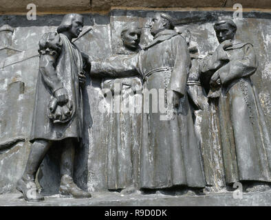 Spagna. La Catalogna. Barcellona. Il monumento di Cristoforo Colombo. Progettato da Gaieta Buigas (1851-1919). Dettaglio del bassorilievo. Columbus visita al Monastero di Santa Maria de la Rabida', 1929 scuptor Josep Tenas (1892-1943). Foto Stock