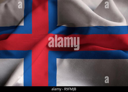 Primo piano della increspato le Isole Faroe Bandiera, Isole Faroe bandiera soffiando nel vento Foto Stock