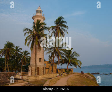 Il fortilizio antico faro in Galle Sri Lanka, in tarda giornata come sun si sta lentamente l'impostazione. Foto Stock