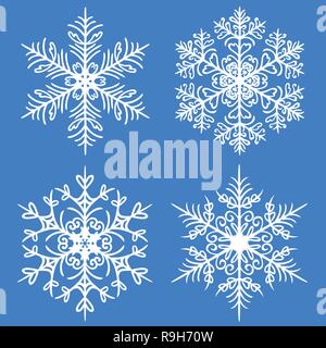 Il simbolo del fiocco di neve serie inverno. Sagome vettoriali su sfondo blu Illustrazione Vettoriale
