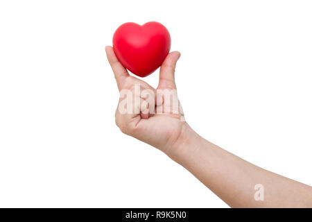 Cuore rosso sfera : Stress mitigatore di sfere di schiuma il cuore rosso forma sulla donna canto isolato su sfondo bianco con tracciato di ritaglio Foto Stock