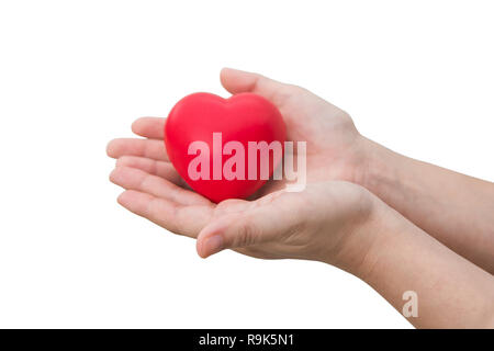 Cuore rosso sfera : Stress mitigatore di sfere di schiuma il cuore rosso forma sulla donna canto isolato su sfondo bianco con tracciato di ritaglio Foto Stock