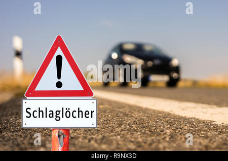 Germania attenzione buche Foto Stock