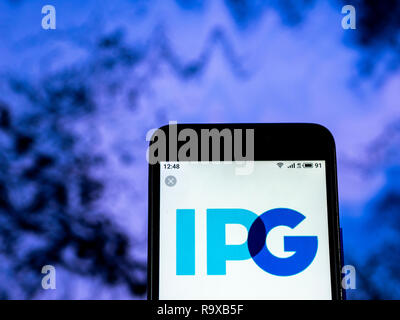 Interpublic gruppo di società società di pubblicità visto il logo visualizzato sul telefono intelligente Foto Stock