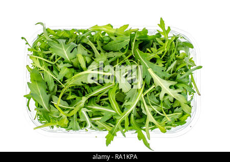 Fresco verde Rucola nel pacchetto isolato su sfondo bianco. Foto Studio Foto Stock